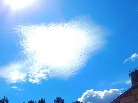 Red clouds in the blue sky Stock Photos