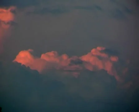 Red clouds in the blue sky at sunset Stock Footage 25606553
