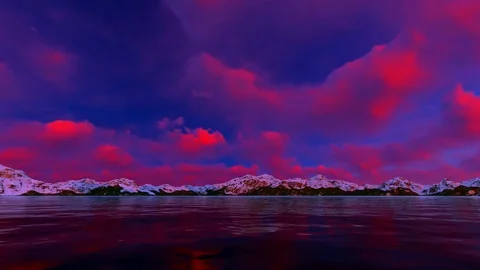 Red Clouds running over Beautiful Mountains Stock Footage 84945736