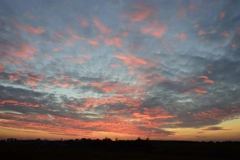 Red clouds at sunset Stock Photos