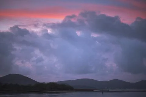 Red clouds at sunset. Stock Photos