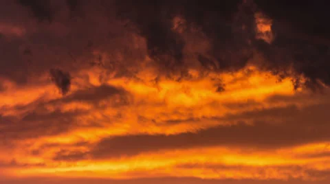 Red clouds at sunset time lapse Stock Footage