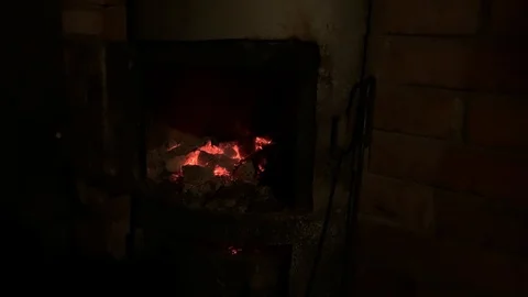 Red coal burns down in the stove of the Russian bath Видео 123798019
