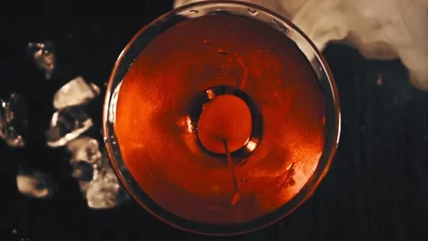 Red cocktail with cherry. Top view Stock Footage 129428436