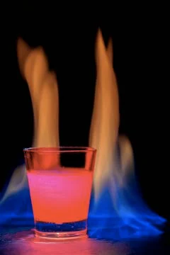 Red cocktail flame Stock-Fotos