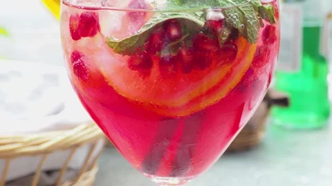 Red cocktail with pomegranate Stock Footage 141815305