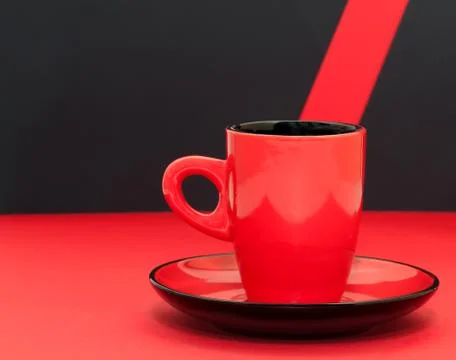 Red coffee cup on a black background Stock Photos