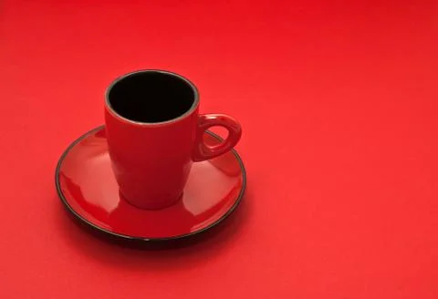 Red coffee cup on a red background Stock Photos