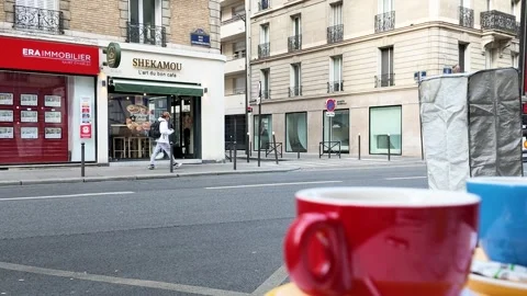 Red Coffee Cup on a Sidewalk Cafe Table in Paris France Stock Footage 334921351