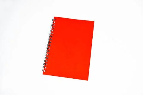 Red color covered single note paper diary isolated on a white background Stock Photos