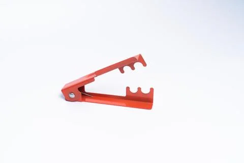The red color of cutting tool DIY rose thorn remover isolated in white backgr Stock Photos