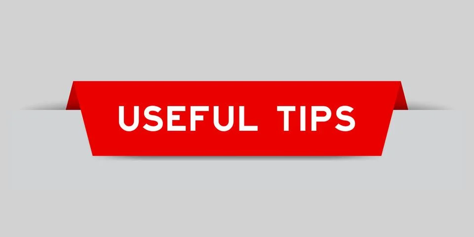 Red color inserted label with word useful tips on gray background Stock Illustration