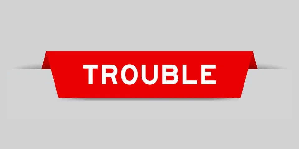 Red color inserted label with word trouble on gray background Stock Illustration