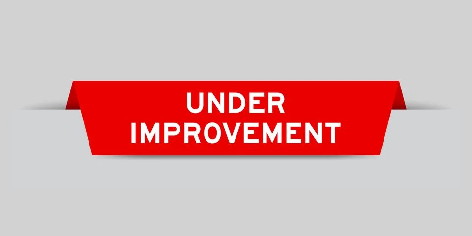 Red color inserted label with word under improvement on gray background 스톡 일러스트