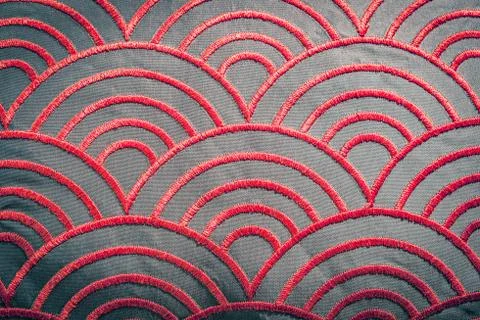 Red color, thread curve pattern texture on textile background Foto stock
