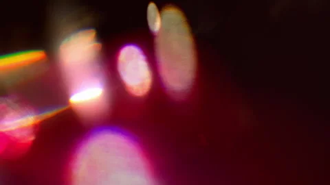 Red-colored bokeh light leak reflection - vfx Video stock 307061835