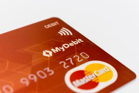 Red colored cimb master card isolated in white background. Stock Photos