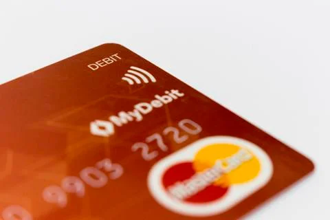 Red colored cimb master card isolated in white background. Stock Photos