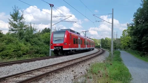 Red-colored commuter train in Böblingen, Germany, 4K Stock Footage 161348296