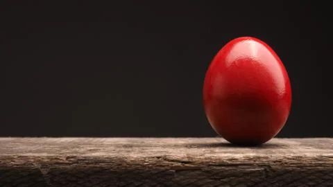 Red Colored Easter egg on wood Stock Photos