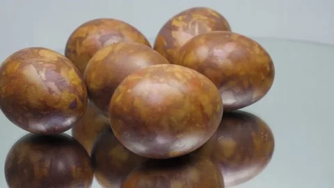 Red colored Easter eggs with marble pattern isolated on white background Stockbeeldmateriaal 229646566