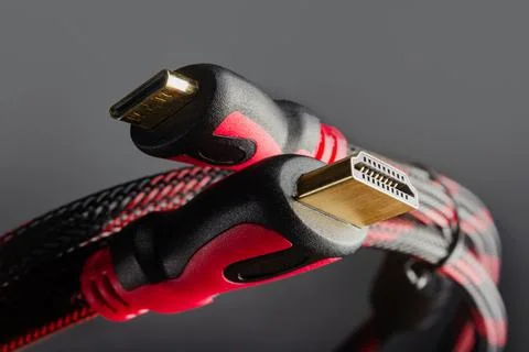 Red colored hdmi cables close-up. Stock Photos