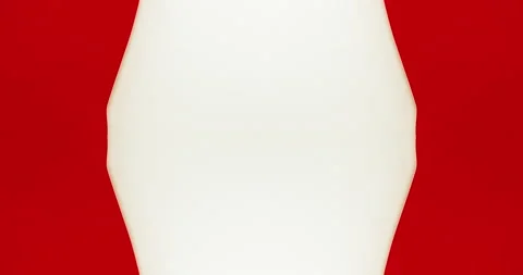 Red colored ink moving to the center on white isolated background. Liquid col Stock Footage 136303144