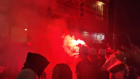 Red coloured light torch glows at a Ramadan festival Stock Footage 276742422