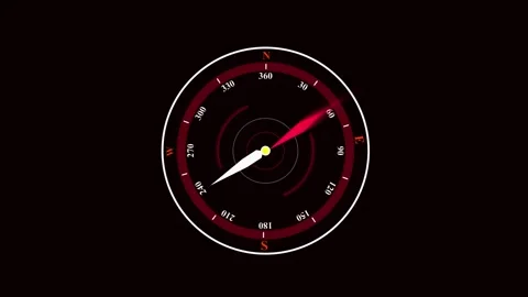 Red compass needle illuminated on dark background with subtle glow highligh.. Stock Footage 321587511