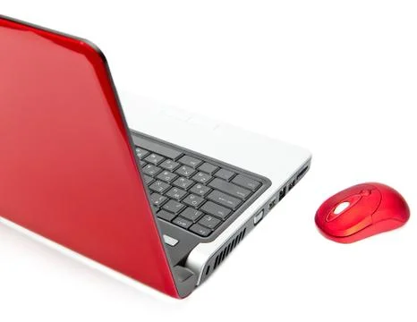 Red computer mouse and red notebook.. Stock Photos