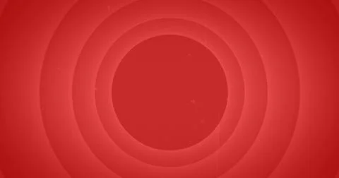 A red concentric circle pattern fills the frame, with copy space Stock Photos