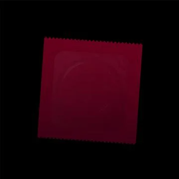 Red Condom Blank Unlabeled Packaging Plastic Envelop Black Background Stock Illustration
