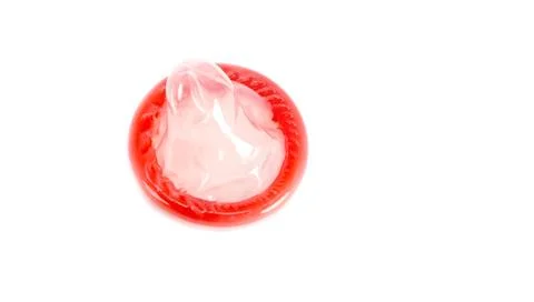 Red condom isolated on white background, Having safe sex for Valentine's Day, Stock Photos