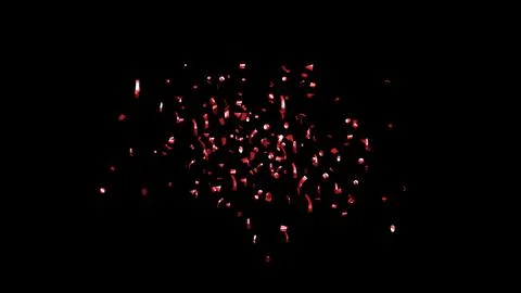 Red Confetti explodes on a black background Stock Photos
