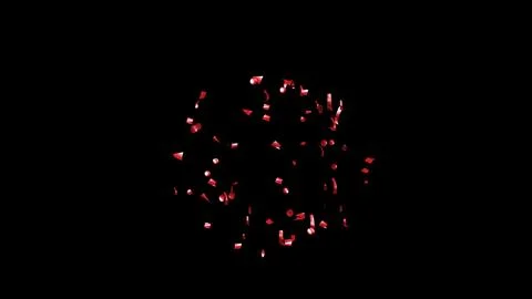 Red Confetti explodes on a black background Stock Photos