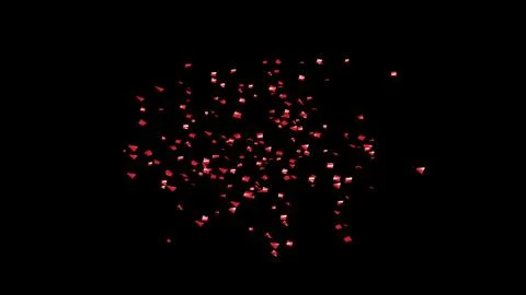 Red Confetti explodes on a black background Stock Photos