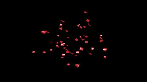Red Confetti explodes on a black background Stock Photos