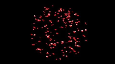Red Confetti explodes on a black background Stock Photos