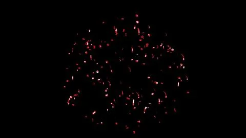 Red Confetti explodes on a black background Stock Photos