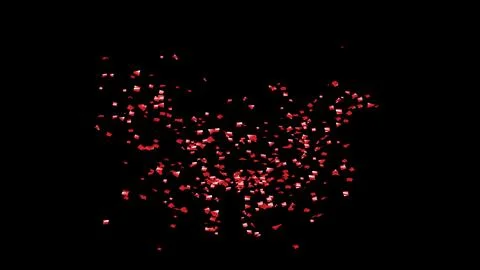 Red Confetti explodes on a black background Stock Photos