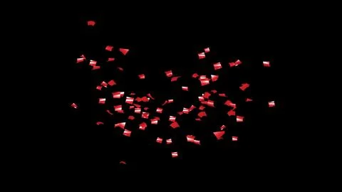 Red Confetti explodes on a black background Stock Photos