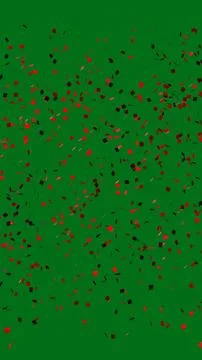 Red Confetti Explosion on Green Screen Stock Photos