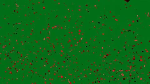 Red Confetti Explosion on Green Screen Stock Photos