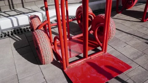 Red construction cart for transporting tools and building materials. Stock-Footage 191434029