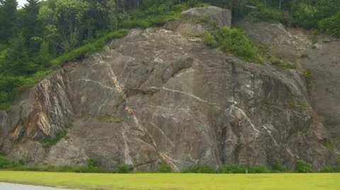 Red Convertible Car Passing a Cliff on the Blue Ridge Parkway Stock Footage 12744023