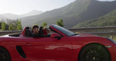 Red Convertible Exterior in Dramatic Evening Light Stock Footage 159349839