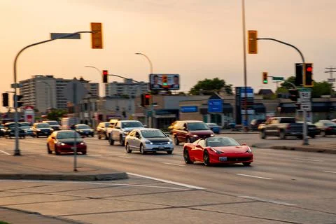 Red Convertible Ferrari - Moving Objects &amp; Objects that Move Stock Photos