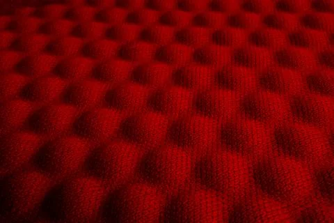 Red convex nylon fabric pattern texture background. Stock Photos