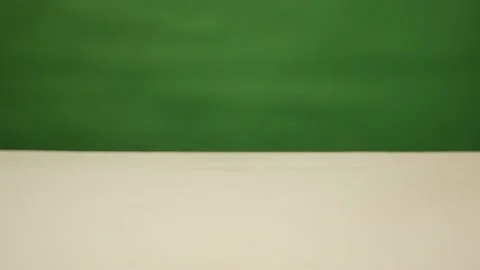 Red corals fall on a wooden table Stock-Footage 163717090