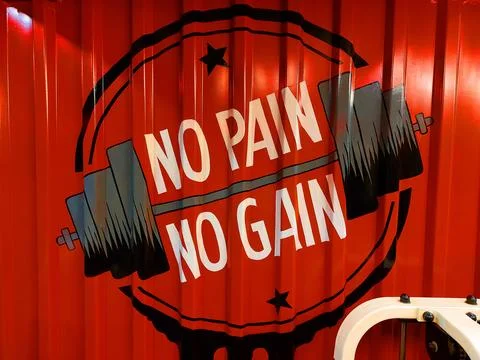 A red corrugated wall with a black and white graphic of a circle Stock Illustration